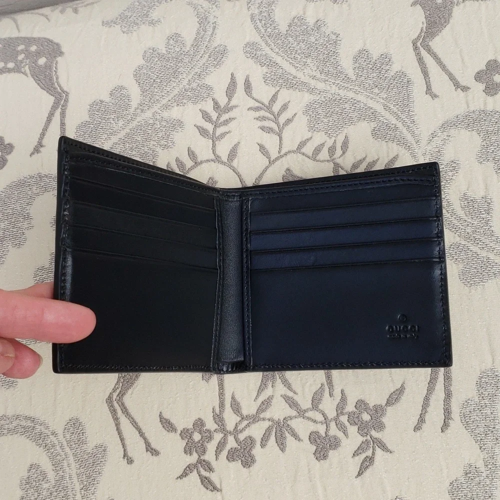 GUCCI GG EMBOSSED LEATHER MEN'S BIFOLD WALLET